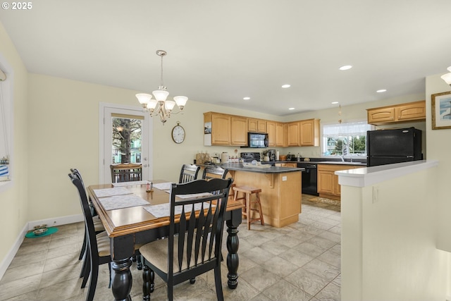 727 SW Bard Rd, Lincoln City, OR 97367 - dining space with a chandelier, recessed lighting, and baseboards