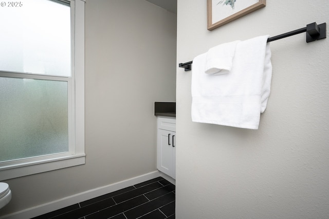 bathroom featuring baseboards