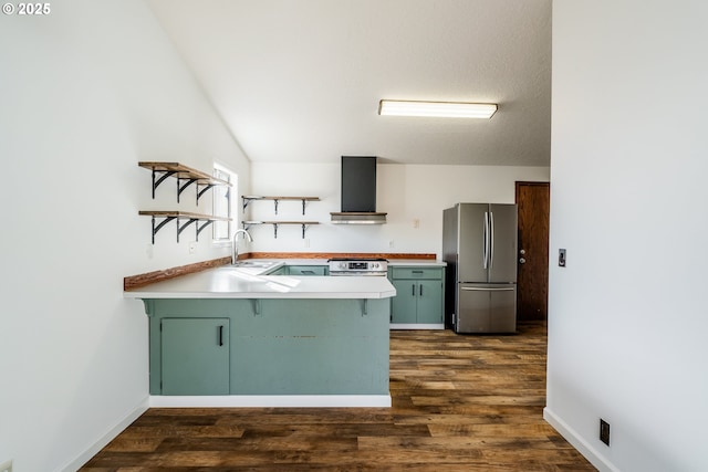 kitchen featuring sink, ventilation hood, appliances with stainless steel finishes, dark hardwood / wood-style flooring, and green cabinets