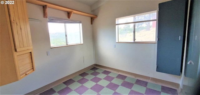 empty room featuring light tile flooring