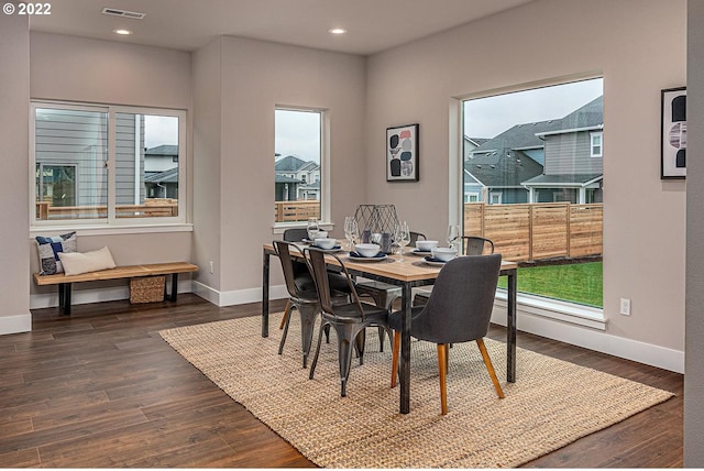 dining area featuring dark hardwood / wood-style flooring