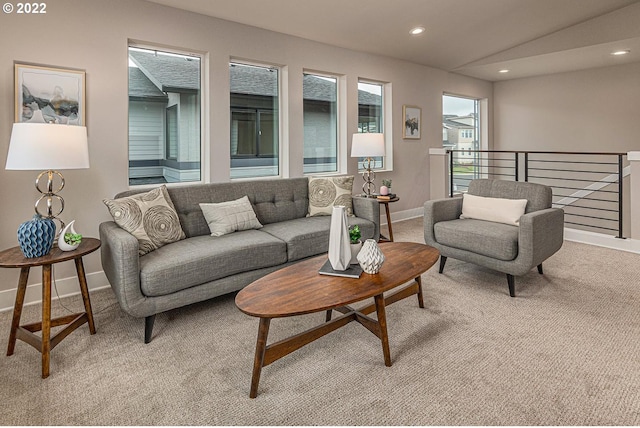 living room featuring light carpet