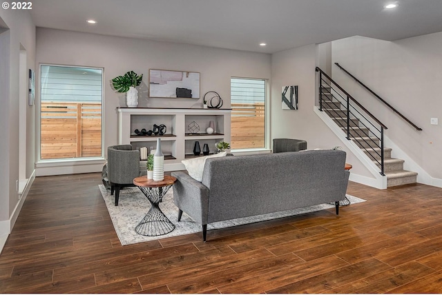 living room featuring dark wood-type flooring