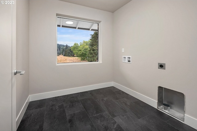 clothes washing area with hookup for an electric dryer, dark hardwood / wood-style flooring, and hookup for a washing machine