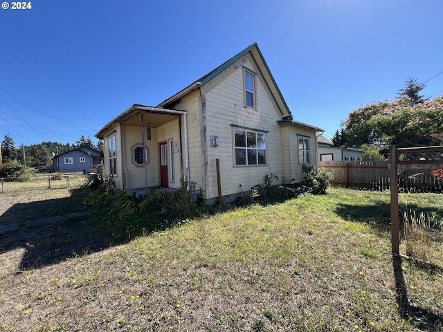 exterior space with a front lawn