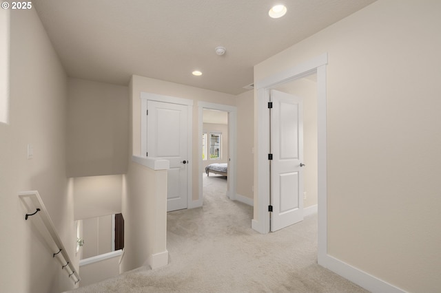 13193 SW Aubergine Ter, Sherwood, OR 97140 - hallway with an upstairs landing, carpet flooring, and recessed lighting