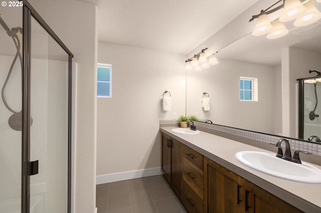 13193 SW Aubergine Ter, Sherwood, OR 97140 - bathroom with double vanity, a shower stall, and tile patterned floors