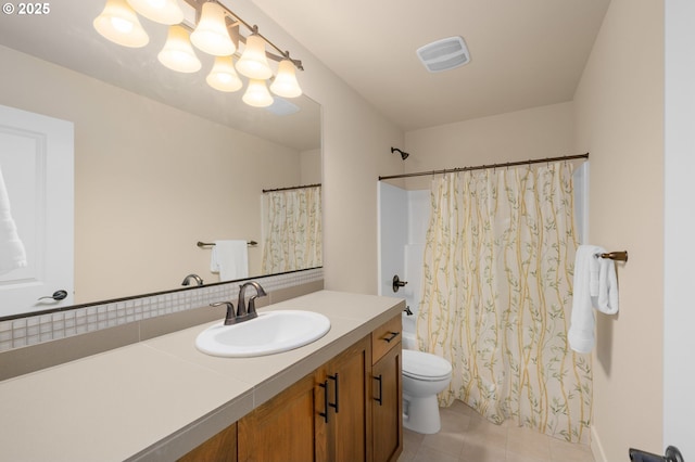 13193 SW Aubergine Ter, Sherwood, OR 97140 - bathroom featuring vanity, tile patterned flooring, and shower / bath combo with shower curtain