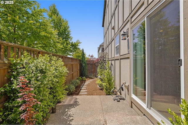13193 SW Aubergine Ter, Sherwood, OR 97140 - fenced backyard with a patio area