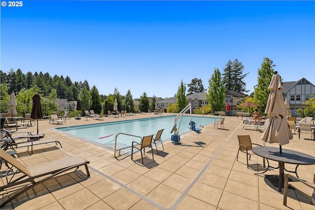 13193 SW Aubergine Ter, Sherwood, OR 97140 - community pool featuring a patio