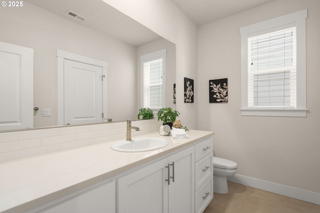 16648 SW Colorado Ln, Tigard, OR 97224 - bathroom featuring vanity, toilet, and baseboards