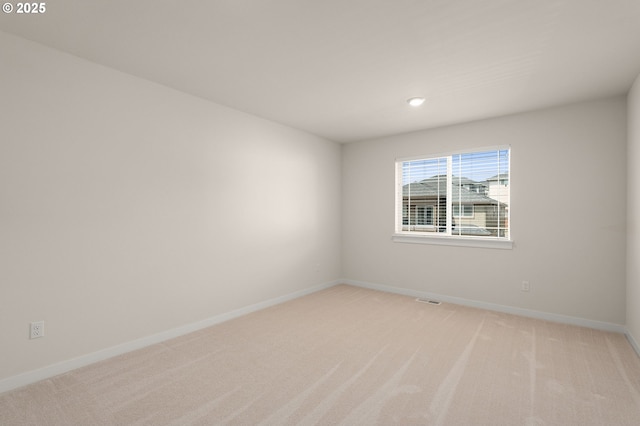 16648 SW Colorado Ln, Tigard, OR 97224 - empty room with light colored carpet, baseboards, and recessed lighting