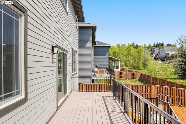 16648 SW Colorado Ln, Tigard, OR 97224 - wooden deck with a fenced backyard