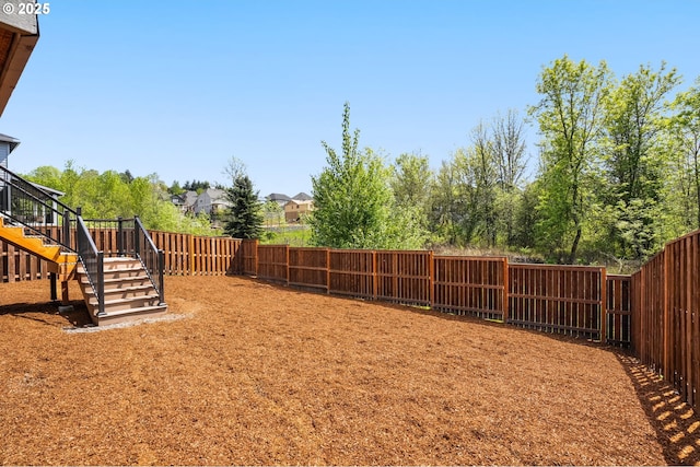 16648 SW Colorado Ln, Tigard, OR 97224 - fenced backyard with stairs