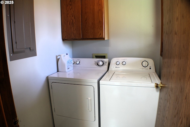 924 Lou Gray Dr, Myrtle Creek, OR 97457 - laundry area with electric panel, washing machine and dryer, and cabinet space