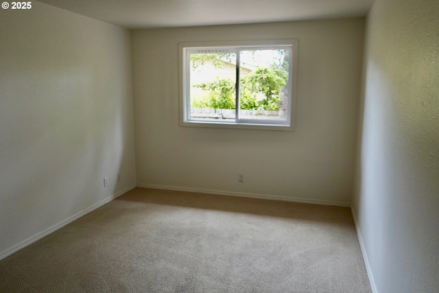1680 22nd St, Florence, OR 97439 - unfurnished room featuring carpet flooring and baseboards