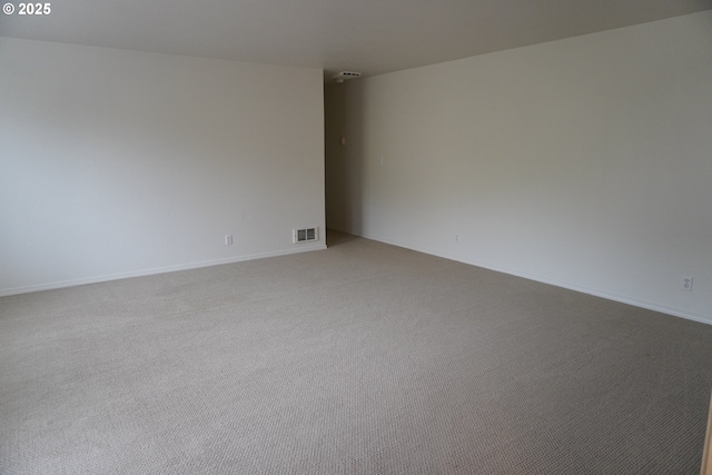1680 22nd St, Florence, OR 97439 - unfurnished room featuring light colored carpet and baseboards