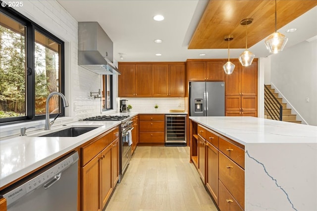 3520 Red Cedar Way, Lake Oswego, OR 97035 - kitchen featuring wine cooler, appliances with stainless steel finishes, wall chimney exhaust hood, recessed lighting, and light wood-type flooring
