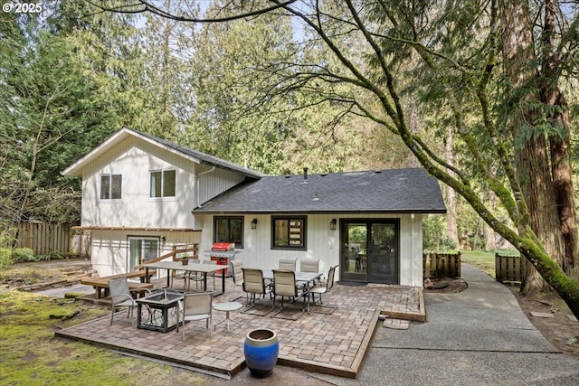 3520 Red Cedar Way, Lake Oswego, OR 97035 - rear view of house with a patio area and roof with shingles