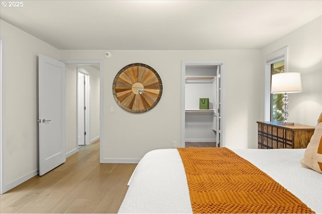 3520 Red Cedar Way, Lake Oswego, OR 97035 - bedroom featuring light wood-type flooring and a spacious closet