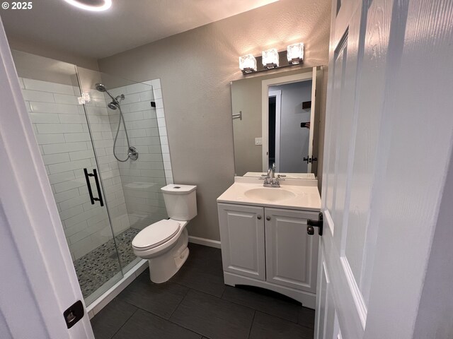 891 NE Bunyard Pl, Estacada, OR 97023 - bathroom with vanity, a stall shower, tile patterned flooring, and toilet