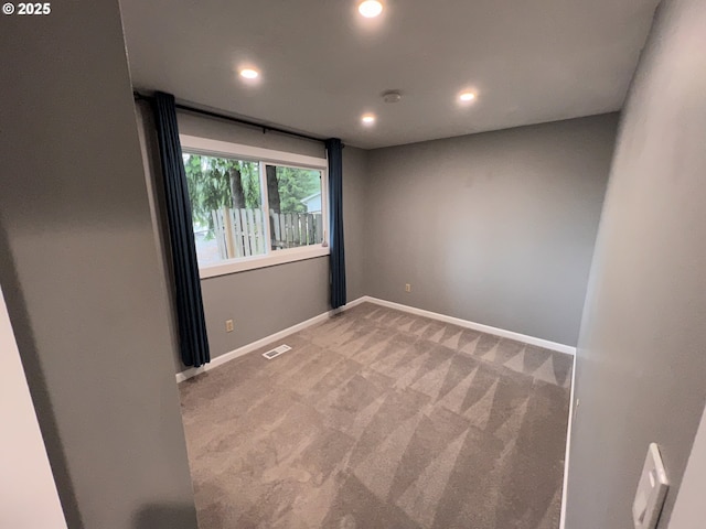 891 NE Bunyard Pl, Estacada, OR 97023 - spare room featuring light carpet, recessed lighting, and baseboards