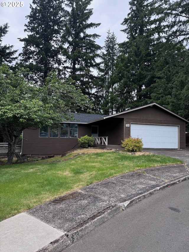 891 NE Bunyard Pl, Estacada, OR 97023 - view of front of home with driveway, a front lawn, and an attached garage