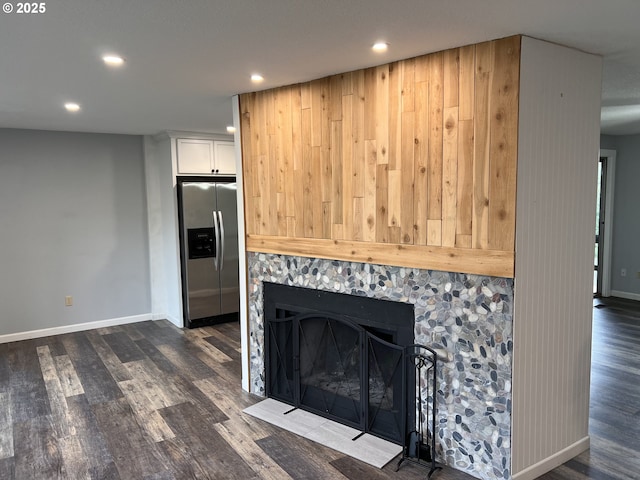 891 NE Bunyard Pl, Estacada, OR 97023 - detailed view of stainless steel fridge, wood finished floors, recessed lighting, baseboards, and a fireplace with flush hearth