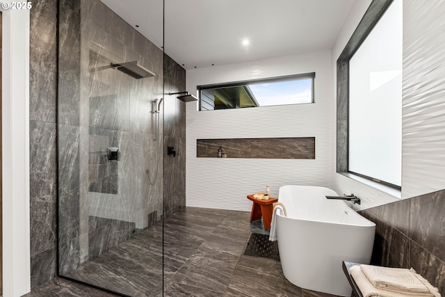 NE 43rd Cir Lot 5, Camas, WA 98607 - bathroom with tiled shower, a soaking tub, tile walls, and marble finish flooring
