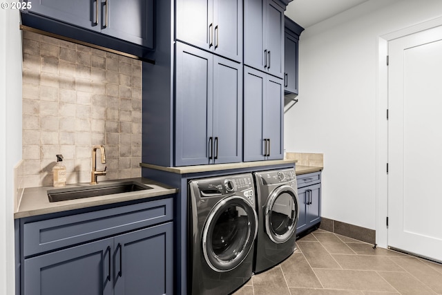 NE 43rd Cir Lot 5, Camas, WA 98607 - laundry room with cabinet space, washer and dryer, tile patterned flooring, and baseboards