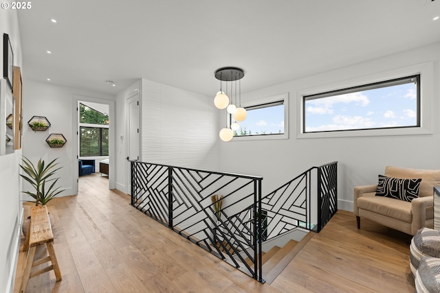 NE 43rd Cir Lot 5, Camas, WA 98607 - hallway with an upstairs landing, light wood-type flooring, recessed lighting, and baseboards