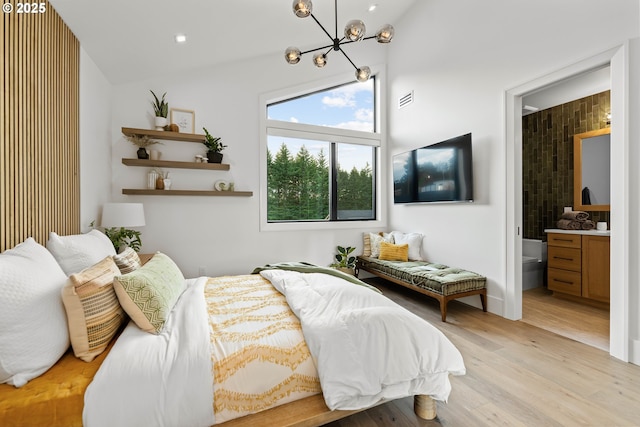 NE 43rd Cir Lot 5, Camas, WA 98607 - bedroom with a chandelier, vaulted ceiling, wood finished floors, connected bathroom, and recessed lighting