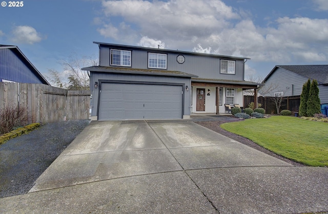 traditional-style house with a garage, driveway, a front lawn, and fence