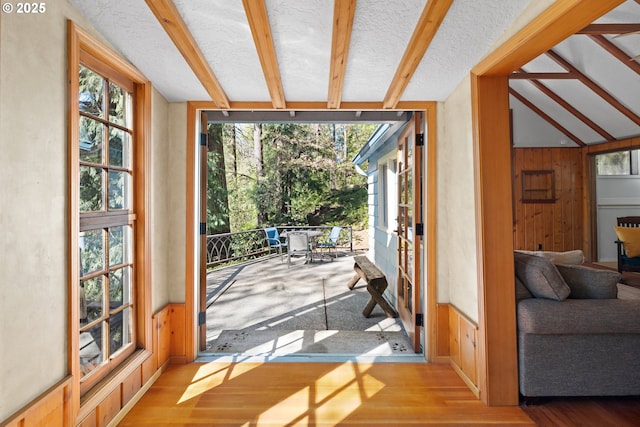 22345 S Poplar Rd, Estacada, OR 97023 - doorway to outside with wood finished floors, wooden walls, and beamed ceiling