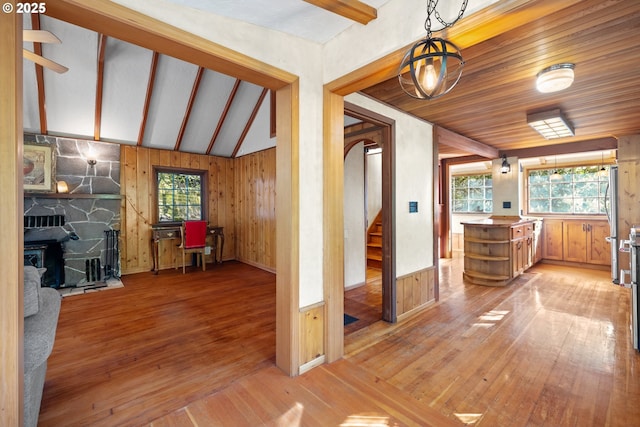 22345 S Poplar Rd, Estacada, OR 97023 - hallway featuring light wood finished floors, stairs, wood walls, and beam ceiling