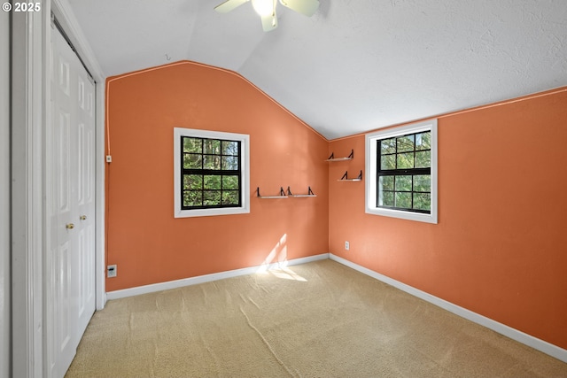 22345 S Poplar Rd, Estacada, OR 97023 - unfurnished bedroom with vaulted ceiling, carpet flooring, a closet, and a ceiling fan