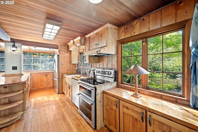 22345 S Poplar Rd, Estacada, OR 97023 - kitchen with wooden counters, appliances with stainless steel finishes, under cabinet range hood, open shelves, and wooden ceiling