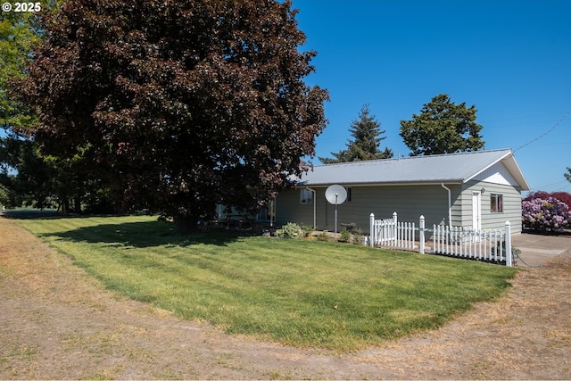 view of home's exterior featuring metal roof