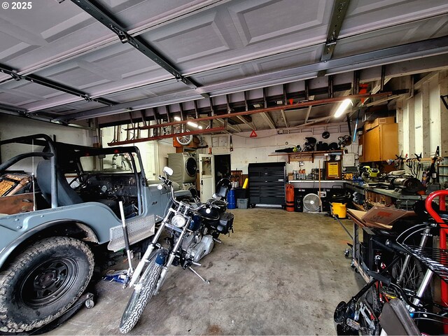 garage with a workshop area