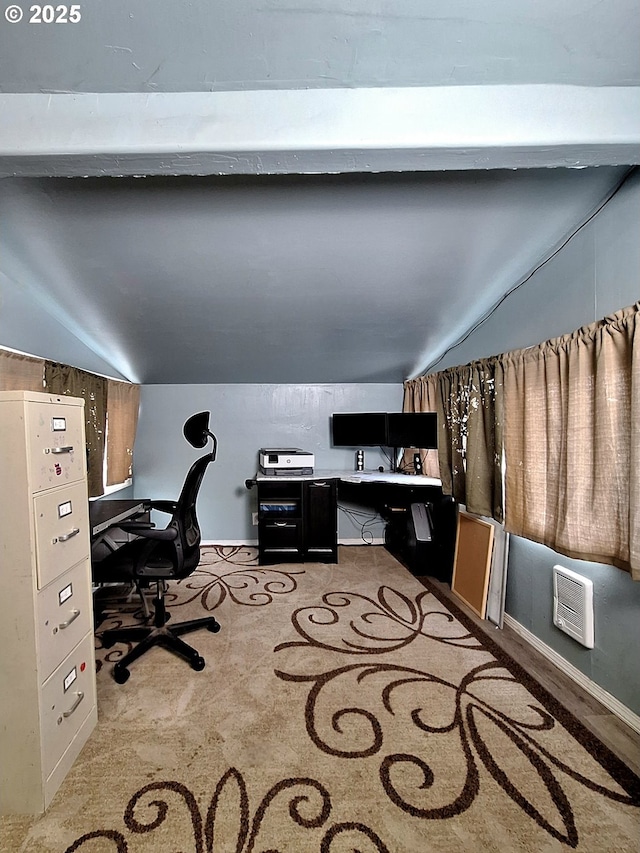 home office featuring lofted ceiling with beams