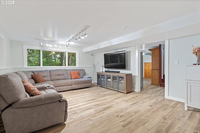 2245 SW Martha St, Portland, OR 97239 - living area featuring light wood-type flooring and track lighting