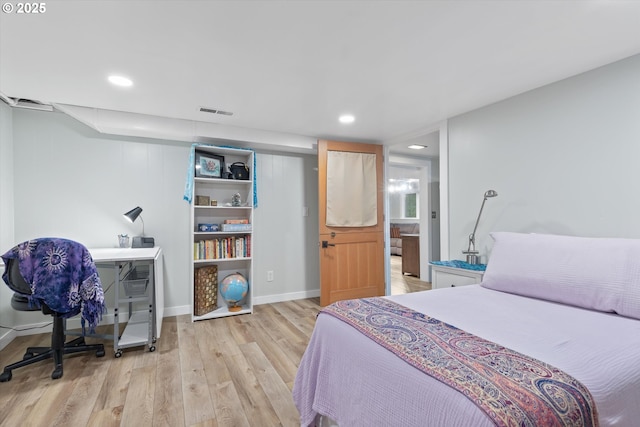 2245 SW Martha St, Portland, OR 97239 - bedroom featuring light wood-style floors and recessed lighting
