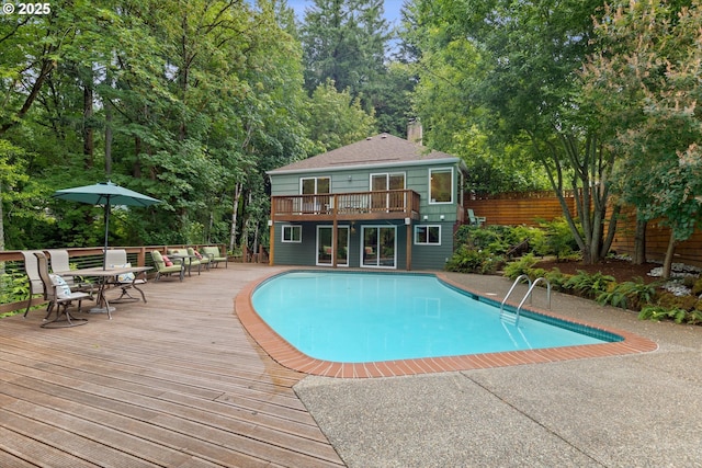 2245 SW Martha St, Portland, OR 97239 - view of pool featuring a wooden deck and outdoor dining space