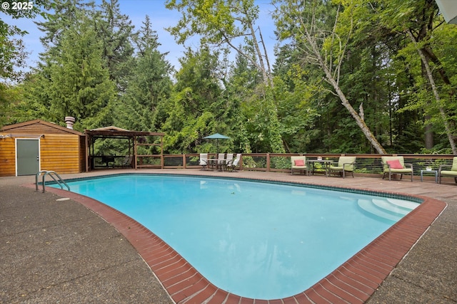 2245 SW Martha St, Portland, OR 97239 - view of swimming pool featuring a gazebo, an outdoor structure, and view of scattered trees