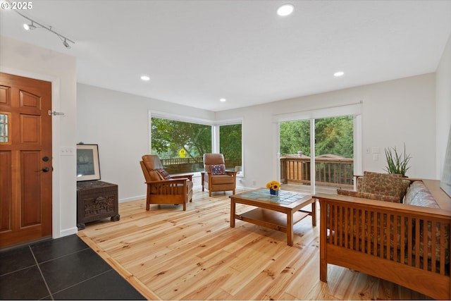 2245 SW Martha St, Portland, OR 97239 - living room featuring recessed lighting, track lighting, and tile patterned floors