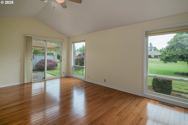 533 Fountain Ct, Keizer, OR 97303 - empty room with a ceiling fan, healthy amount of natural light, wood finished floors, and lofted ceiling