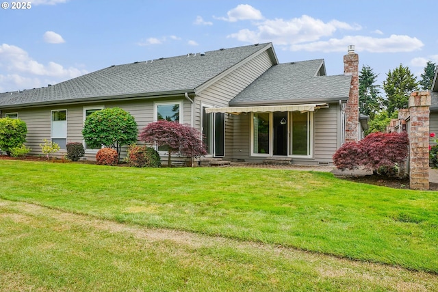 533 Fountain Ct, Keizer, OR 97303 - rear view of house with a chimney, a yard, and a shingled roof