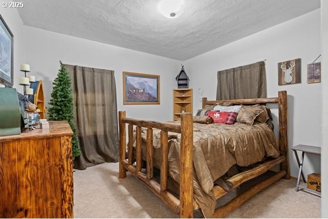 680 S Alfalfa St, Heppner, OR 97836 - bedroom with light carpet and a textured ceiling