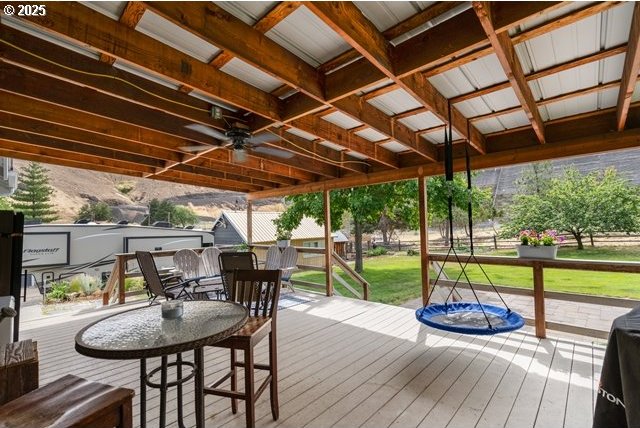 680 S Alfalfa St, Heppner, OR 97836 - deck with ceiling fan and a yard