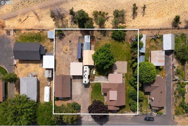 680 S Alfalfa St, Heppner, OR 97836 - aerial perspective of suburban area featuring property parcel outlined